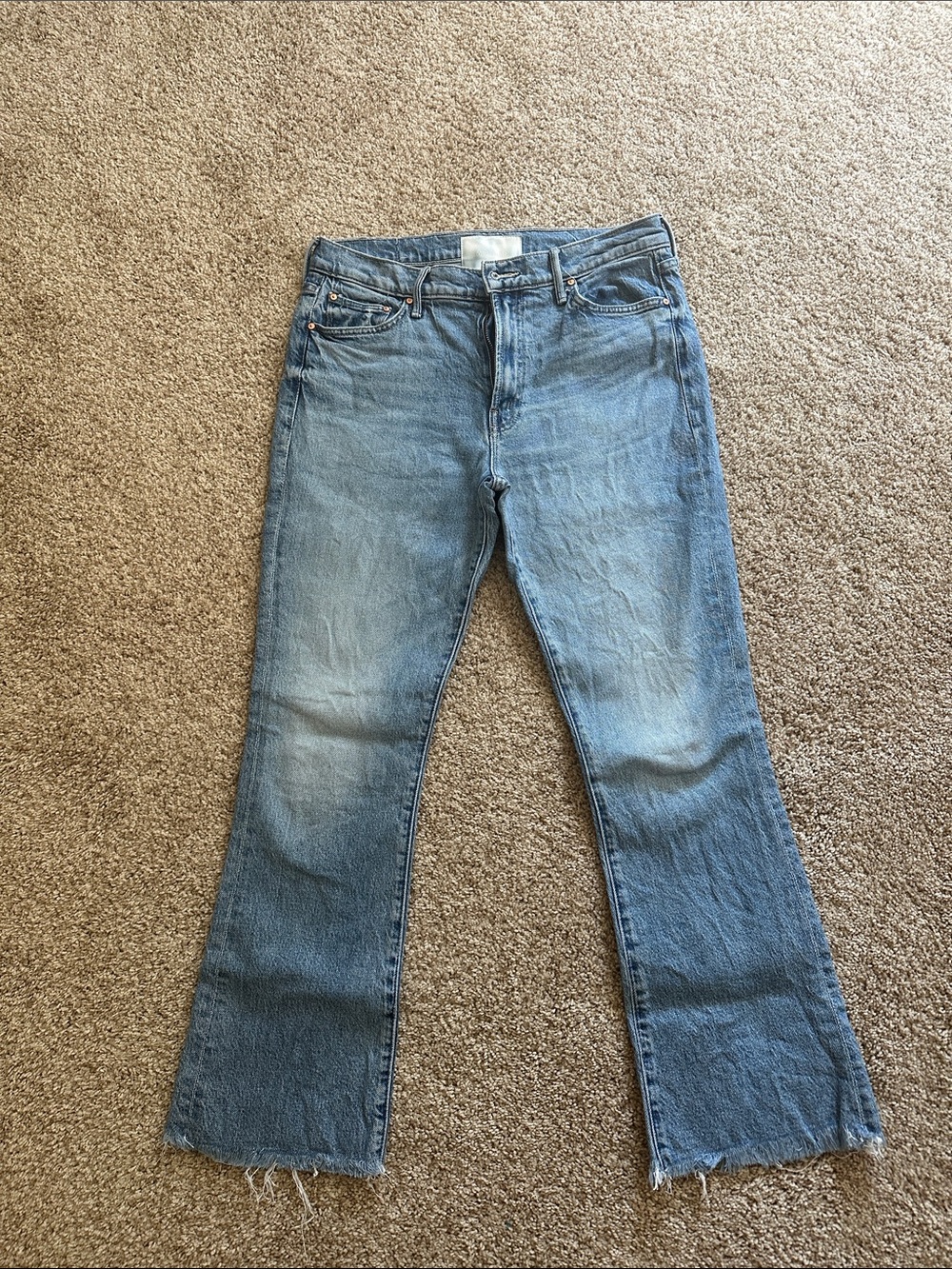 MOTHER Light Blue Flare Jeans with Raw Hem